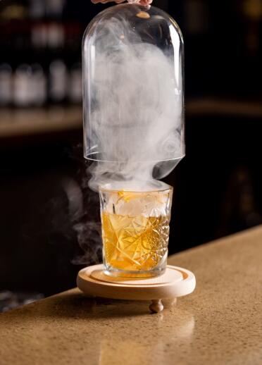 drink being presented with smoke